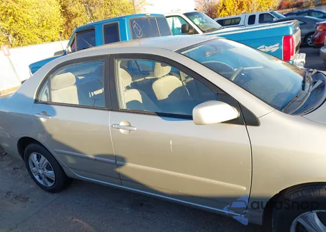 2004 Toyota Corolla Le z USA, uszkodzony, nr VIN JTDBR32E142021359